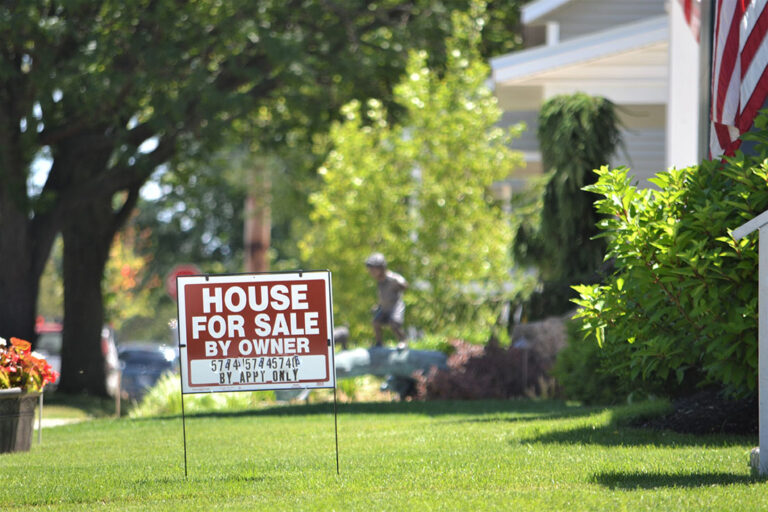 front yard sign house for sale by owner
